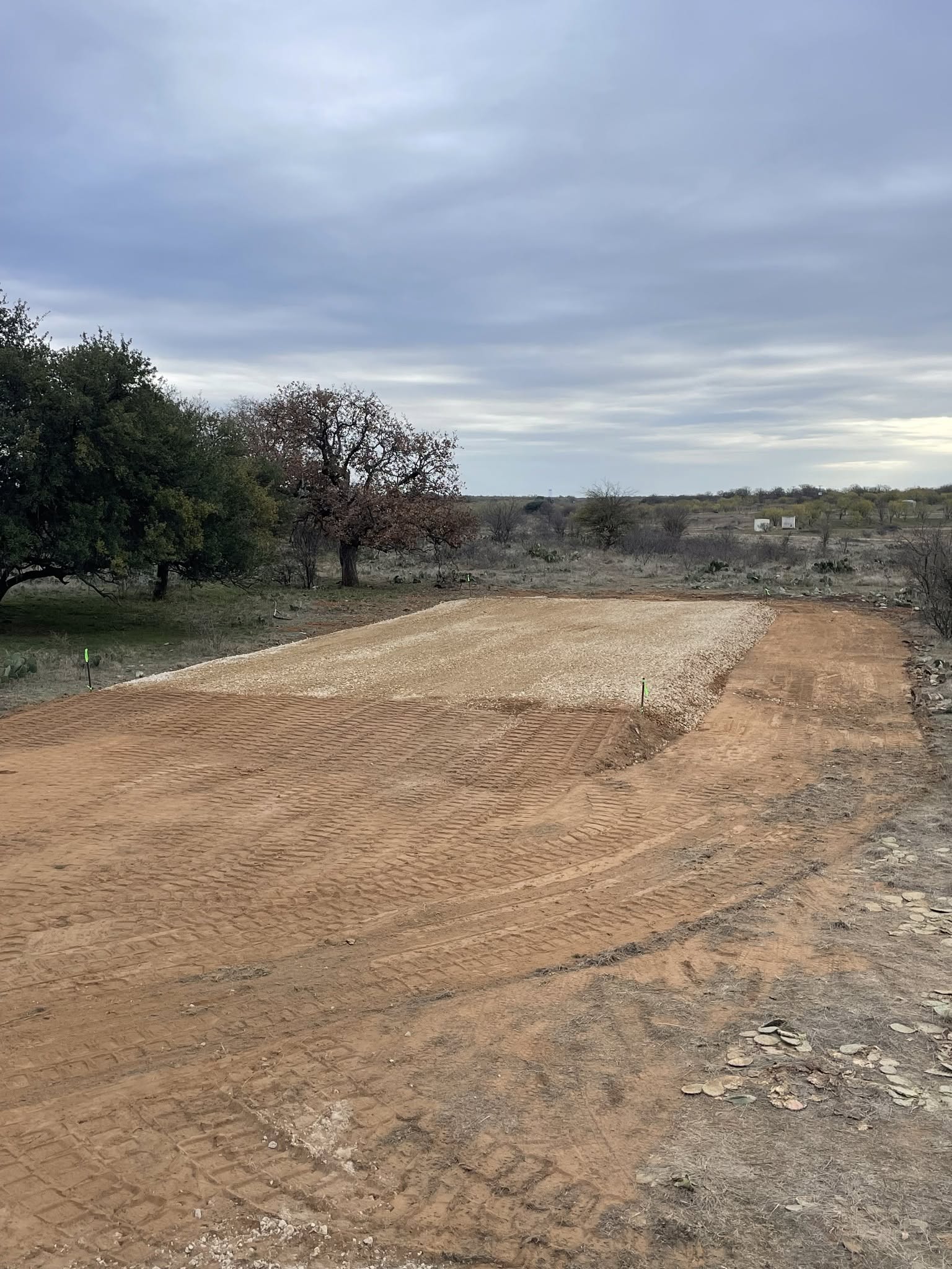 Gravel pad preparation for an underground system installation